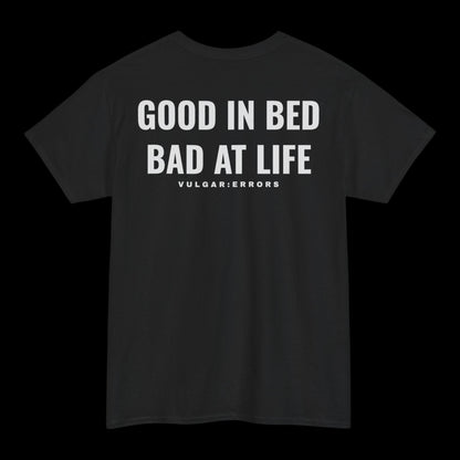 "Bad At Life" Vulgar Errors t-shirt in black, back view showing the large white slogan back print