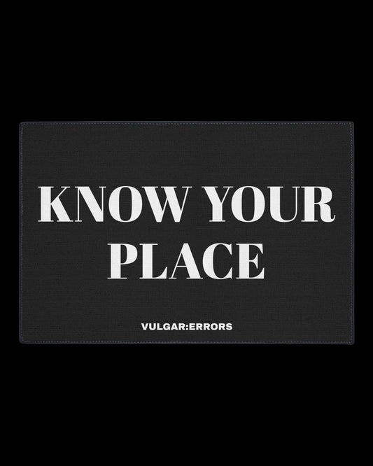 Vulgar Errors Know Your Place Doormat 18x24 inch with bold black slogan print on natural coir-style mat