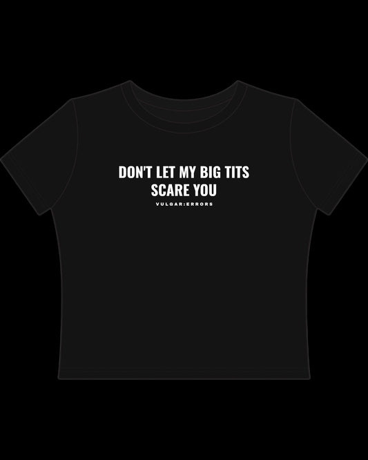 Vulgar Errors Don't Let Them Baby Tee with white chest slogan print on fitted black cotton