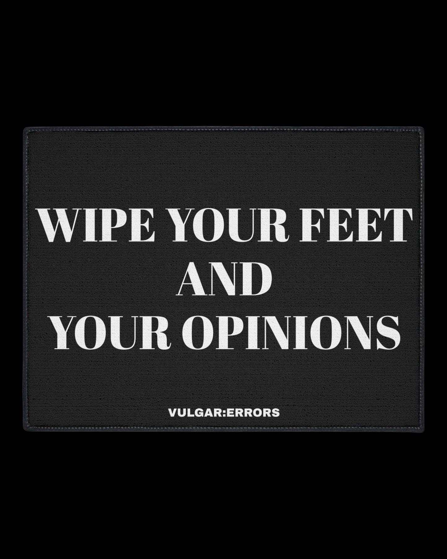 Vulgar Errors Wipe Your Opinions Doormat 18x27 inch with bold black slogan print on natural coir-style mat