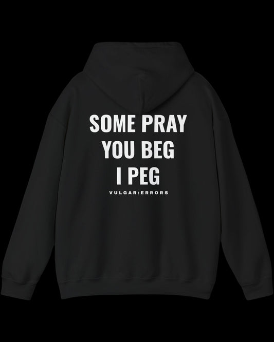 Vulgar Errors Some Pray, You Beg Hoodie with large white back slogan print on black cotton
