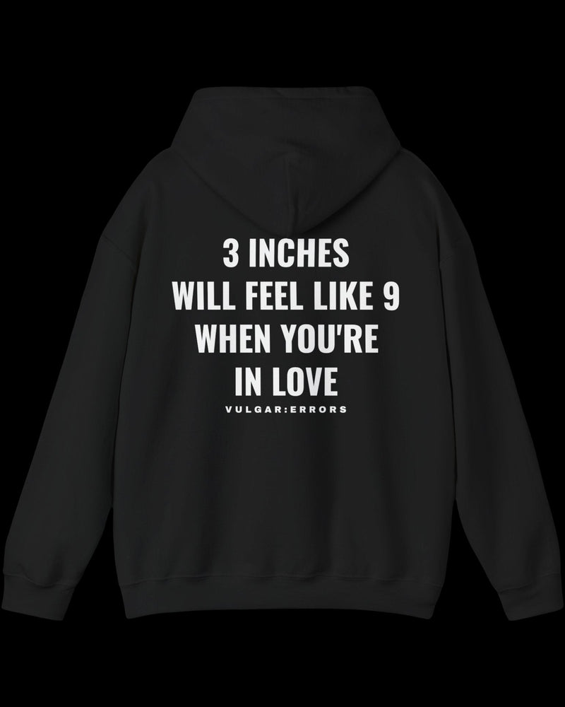 Vulgar Errors 3 Inches Like 9 Hoodie with large white back slogan print on black cotton