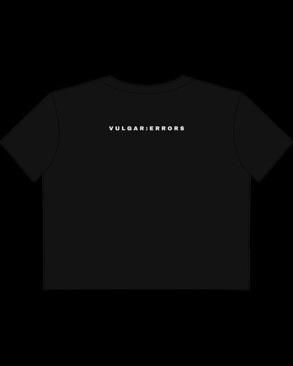 Back view of fitted black baby tee showing cropped shape, short sleeves, and clean cotton finish