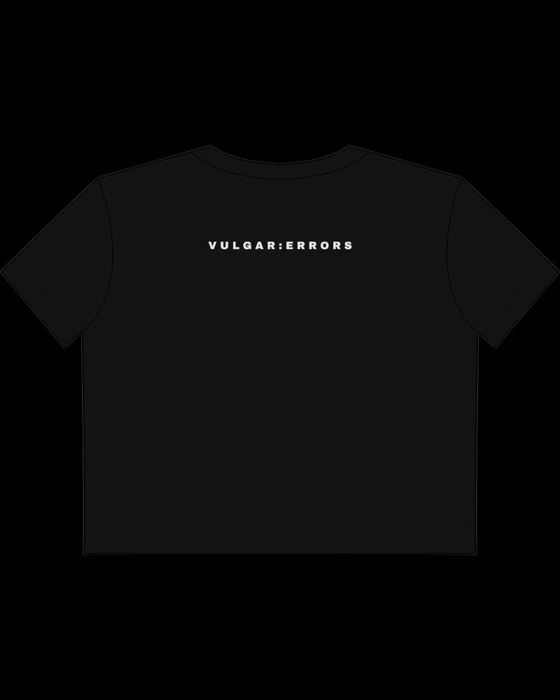 Back view of fitted black baby tee showing cropped shape, short sleeves, and clean cotton finish