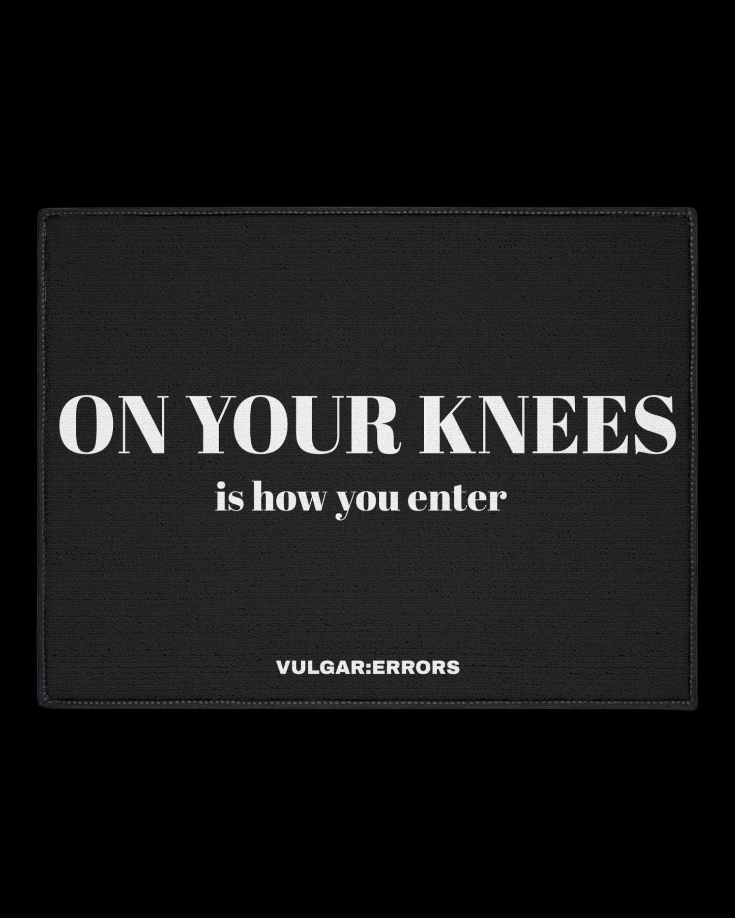 Vulgar Errors On Your Knees Doormat 18x27 inch with bold black slogan print on natural coir-style mat
