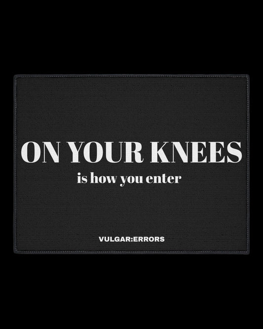 Vulgar Errors On Your Knees Doormat 18x27 inch with bold black slogan print on natural coir-style mat