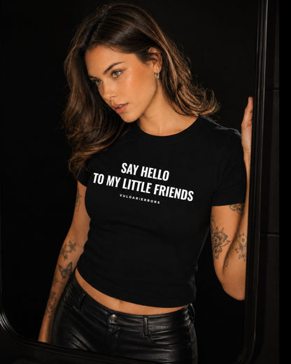 Vulgar Errors Say Hello Baby Tee with white chest slogan print on fitted black cotton