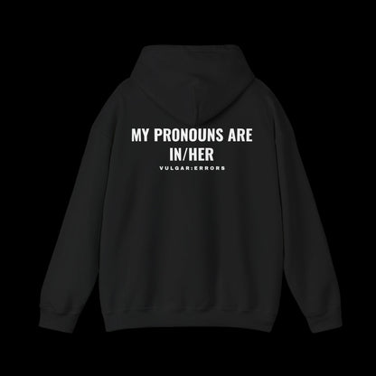 MY PRONOUNS ARE IN/HER Hoodie by Vulgar Errors, black hoodie, photo 1 on a black background