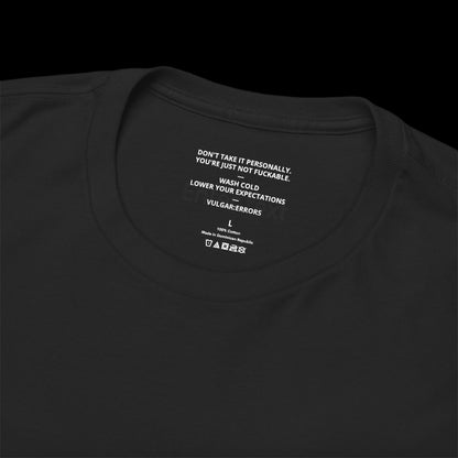 NOT INTERESTED Tee, neck label, black on black background