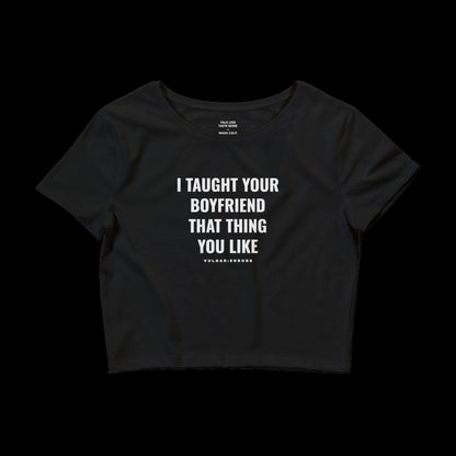 "I TAUGHT YOUR BOYFRIEND BABY TEE" Vulgar Errors cropped baby tee in black, back view showing the large white slogan back print