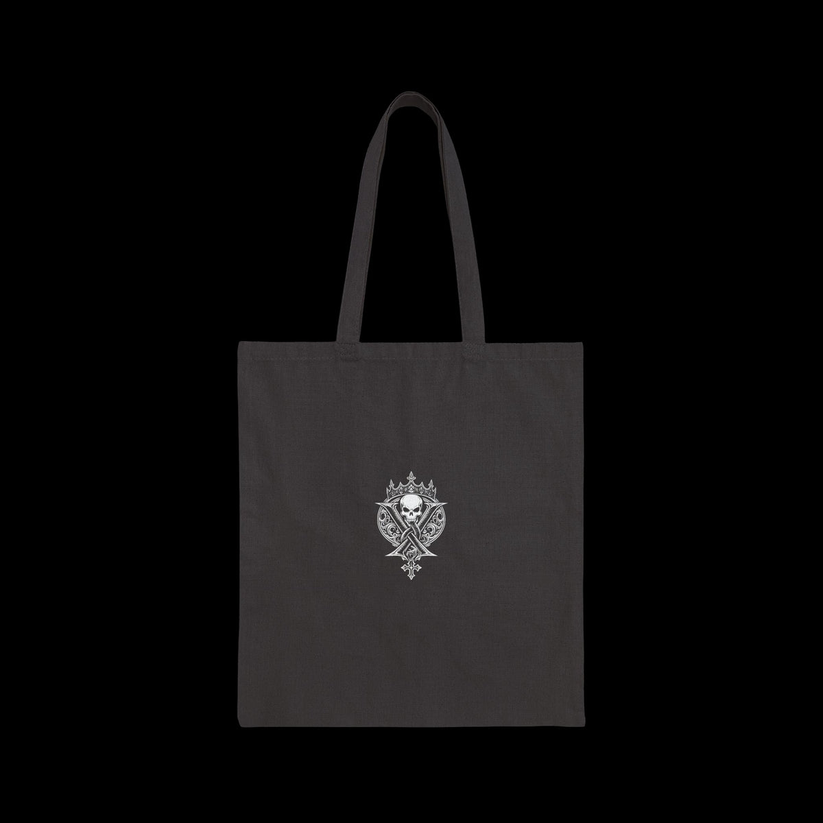 Vulgar Errors black cotton canvas tote bag featuring a detailed white ornate skull crest graphic on the front