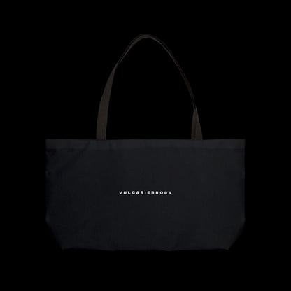 Vulgar Errors black weekender tote bag with white logo, durable spun polyester exterior and sturdy woven handles.