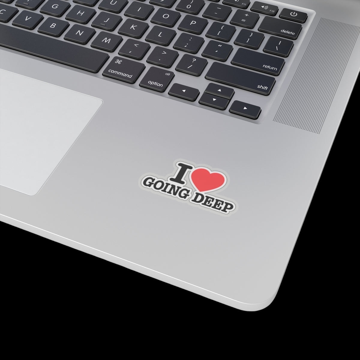 Vulgar Errors I Heart Going Deep glossy vinyl sticker applied to a silver laptop surface